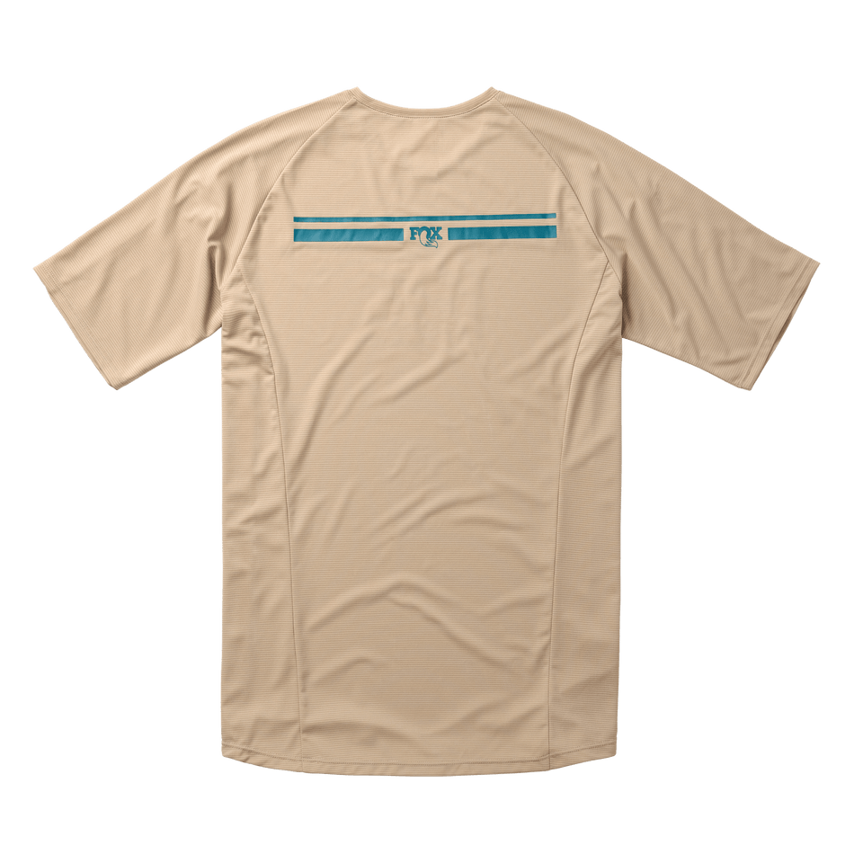 https://serenity-foxfactory.asset.akeneo.cloud/fox_asset_family/media/SSG_Apparel_Hightail_SS_Jersey___Dune___Back.png